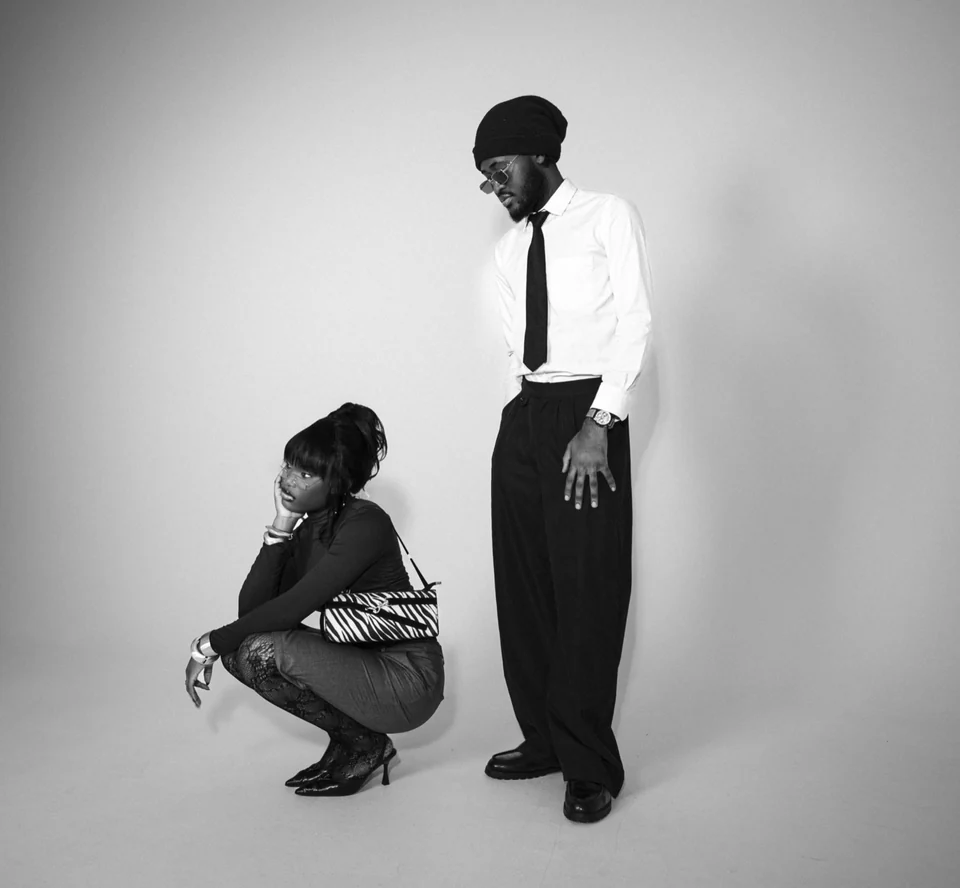 Black-and-white studio composition showing Mr. DURBA in two poses